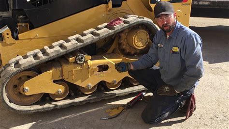 how to adjust track on c210 new holland skid steer|How to adjust CTL track tension .